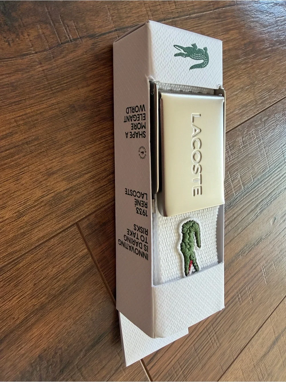 Lacoste white belt with green crocodile logo